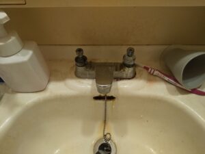 スピンドルパッキン劣化により水漏れしていた洗面水栓